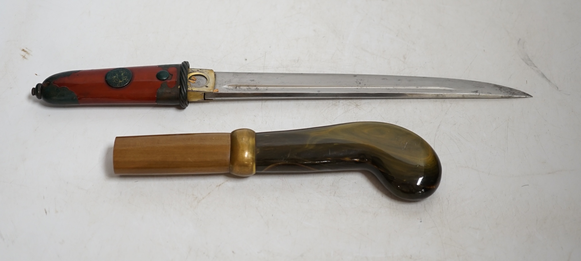 A Japanese knife in lacquered sheath and a handle, largest 34cm in length. Condition - fair to good